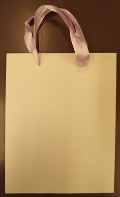 Középméretű dísztáska halvány lila fehér pöttyös
